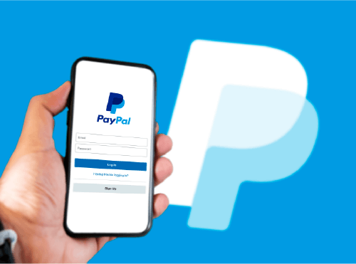 its a man holding his phone and ready to pay with PayPal
